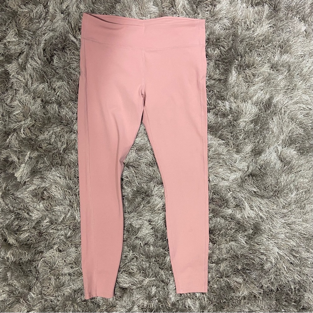 Joe Fresh women pink, hidden waist band pocket leggings. Size M. Used.